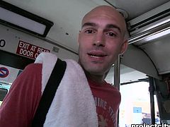 A very sexy gay guy with short dark hair and a fantastic body enjoys a mind-blowing ass fuck on a bus. Hear him moan with pleasure now!