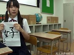 Slutty Japanese chick Tsubomi, wearing a college uniform, is playing dirty games with a guy indoors. She shows her natural tits to the dude, then kneels in front of him and sucks his wang.