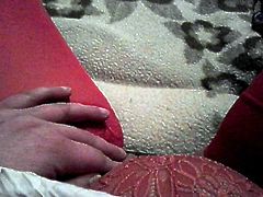 Playing with my pussy in red stockings and lace thongs