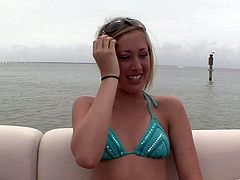 Lesbian babes with nipple and navel piercings outdoor on the yacht sucking on tits and showing off hot ass and tits in bikini