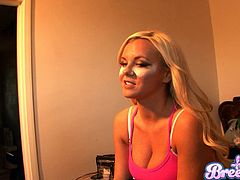 We catch up with sexy pornstar Bree Olson backstage as she gets her blonde hair done then she sits on the toilet and pees.