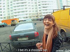 A sizzling brunette with long hair, petite beautiful tits and an awesome body enjoys sucking her boyfriend's big cock in public.
