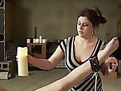 Lesbian femdom spanks waxes fists and masturbates her submissive