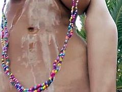 Ultra busty woman having beads in snatch