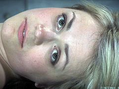 Watch as this blonde slave is locked into the stocks and tortured by her master. He puts clamps on her mouth and pulls them apart so her mouth is gaped open. He whips her pussy very hard, and then puts her on her back with her legs pushed apart using a metal pole.