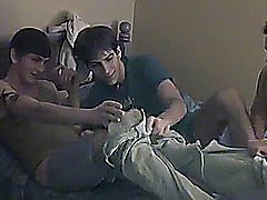 Try as they might, the studs can't persuade timid Nathan to take part in a three way with them