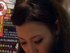 Asian publicsex amateur tasting hard cock in the video store