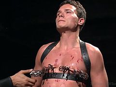 Candle wax is poured all over this slave's body and he is in so much pain, but it feels really good. He screams as the master puts clamps on his nipples. What other type of torture will the master make his slave endure? Looks like he is getting caned next.