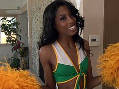 This lovely ebony cheerleader lifts up her skirt and lets her white jock boyfriend, have a nice taste of her yummy pussy. She moans loudly, as he gives her cunnilingus. Would you like to see this hot interracial couple fuck?