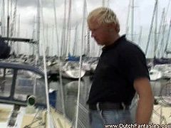 This busty mature bitch from Holland takes a man of her age inside her yacht cabin where she takes his meaty cock inside every available hole that she has.