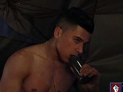 Gay soldiers Armond Rizzo and Sean Duran toying
