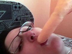 A mature amateur gives head while fucking herself with a toy