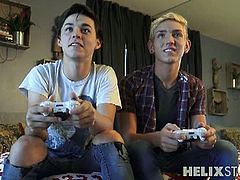 Matthew Keading and Dylan Hall are having a laid back afternoon playing video games and all that but got turned on as they moved on caressing their crotch and kissing passionately leading to a hot ass fucking session.