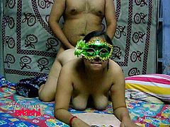 This chubby Indian whore is super horny! She's not afraid to show off her big tits and ass, but she keeps her face hidden. She gives him head and then, bends over in front of him, to take his hard cock from behind.