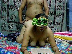 This chubby Indian whore is super horny! She's not afraid to show off her big tits and ass, but she keeps her face hidden. She gives him head and then, bends over in front of him, to take his hard cock from behind.