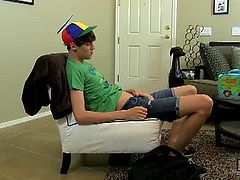 Elijah White arrives home from school and he'd much rather jack off than start on his homework! He gets comfortable in a chair before rubbing his hand over his denim clad crotch. He's not clothed for long though, stripping down to nothing but his hat soon enough. He strokes his big cock before pulling a glass dildo out of his lunchbox, working himself over until he cums.
