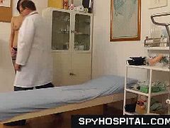 Courtesy of Spy Hospital you can see how a nasty brunette in black stockings gets examined naked by a horny doctor who can't wait to look at her sweet pussy.