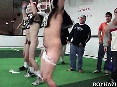 Naked football players playing sex games for fraternity