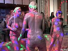 Lesbo excited bitches wrestling in mud at a WAM sex party
