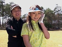 Cute Asian girls play a game of strip golf