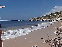 2 GIRLS WITH GREAT BOOBS ARE WALKING IN THE BEACH