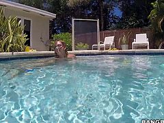 Naughty blonde Chase with toned body takes off her tiny bikini in the pool and opens her legs. She exposes her hairless tight pussy under water. She spreads her pussy lips for your to watch,