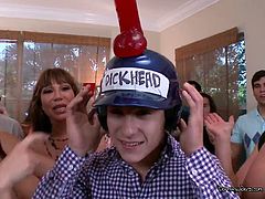 The ladies whip out the world famous dick head dildo and get a guy to wear so they can fuck the dildo on his head. Guy is laughing as they ride, he cant believe he actually has a dick on his head, ha ha. They turns riding this fake cock, they are having fun getting fucked on this guys head.