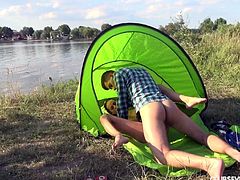 A couple camping at a lake fucks like crazy in their tent