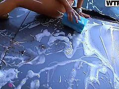 These teen sluts decided to go into the woods for some camping. They then noticed how dirty their car is, took off clothes and started washing it in a real seductive way.