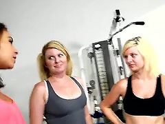 Here we have 3 hot babes at the gym. They are besides working out showing their boobs and looking for some action on the side.