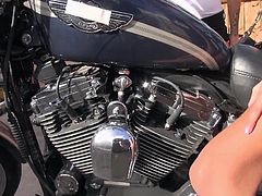 A brown-haired babe has come to the garage, to check out a motorcycle. What she doesn't know is, that she's about to receive the kinkiest challenge in her life so far... Click to see how flexible this bitch can be and enjoy the sight of her slim nude body, as she gets on knees to suck cock!