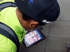 straight asian boy looking at mobile porn