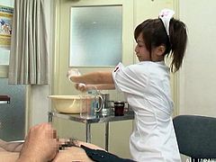Beautiful and kinky Japanese nurse milks a guy's cock & collects jizz