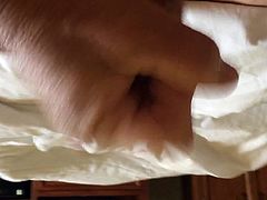 Masturbating