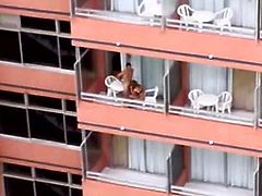 follando en el balcon del hotel 02