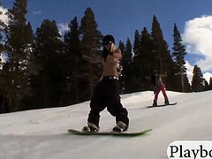 Badass girls snow boarding and shooting while they are naked
