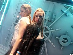 I invited these hot babes over to my new sex room. It's a vault where girls can get naughty and sprayed down. The hot lesbians dance, as the water pours over them. It's like a wet t-shirt contest in overdrive!