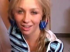 Skinny blonde girl doing herself with blue dildo