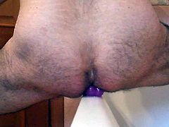 purple dildo in hairy ass