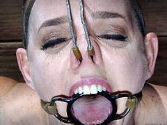 I can not even imagine how Abigail could stand it. Her black tormentor placed her in a special device, with all body parts fixed tough. He roughly fucked her with a dildo, clamped her nipples and stimulated her with a candle fire. Extreme original device bondage with lots of painful humiliation! Rough!