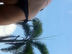 Voyeur at the pool - girl in string bikini