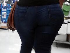 Candid Mexican milf hauling around a big ass.