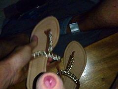 Cum on her sandals at night at the entrance