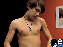 Well built emo twink Andy Kay gives his cock a good rubbing