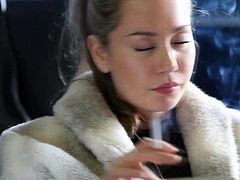 Smoking Fetish with hot blond and a fur coat