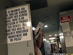 Hot blonde Ryan Riesling tries a huge black dildo in an adult bookstore when suddenly a real black cock appears through Gloryhole...