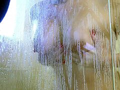 He was watching this milf in the shower and she was so hot, that he had to pull his cock out and show it off. She stepped out of the shower and sucked on his big member, to get all of that sticky cum out.
