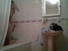 Voyeur - Beautiful blonde getting ready for shower