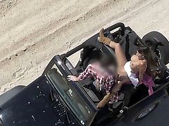 Busty Mercedes Carrera gets in a jeep and takes off her top. She then gets driven around the beach with the hot sun tanning her tight body. She then humps the driver.