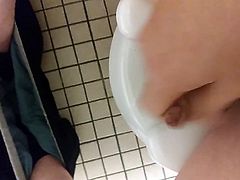 Masturbating in a public restroom